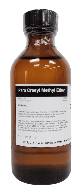 A brown bottle labeled Para Cresyl Methyl Ether HP Fragrance/Aroma Compound.