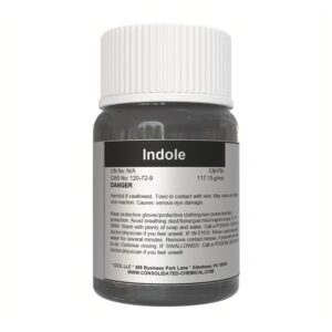 Container of Indole with warning label.